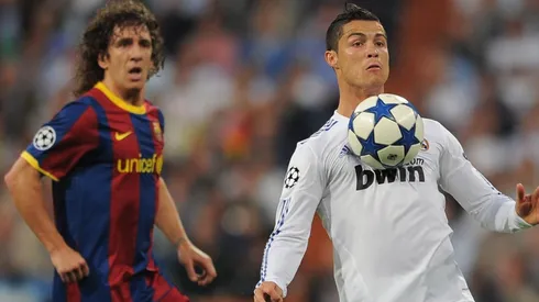 Carles Puyol and Cristiano Ronaldo during a Champions League game between Barcelona and Real Madrid in 2011.