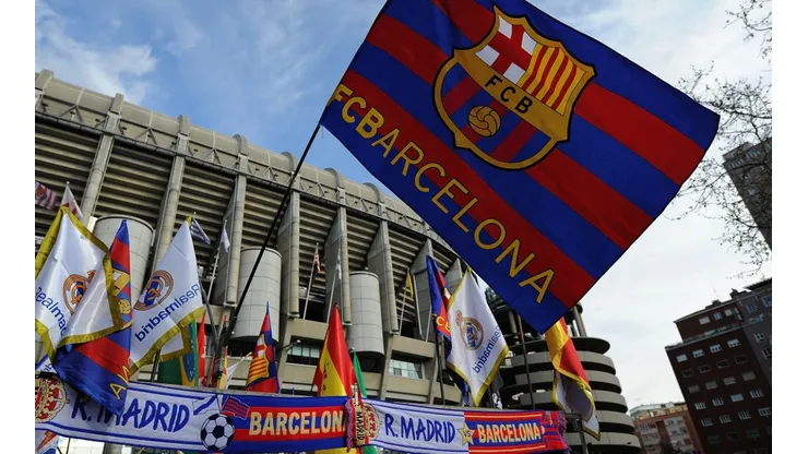 An FC Barcelona flag flies at a merchandise stall.