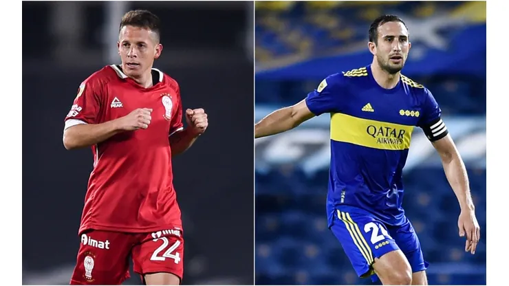 Nicolas Silva of Huracan (left) and Carlos Izquierdoz of Boca Juniors.