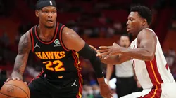 Cam Reddish of the Atlanta Hawks (left) and Kyle Lowry of the Miami Heat (right)