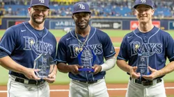 Mike Zunino, Randy Arozarena, Joey Wendle holding their individual team Awards