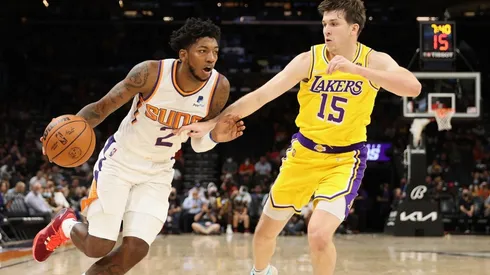 Elfrid Payton of the Phoenix Suns (left) and Austin Reaves of the Los Angeles Lakers (right)