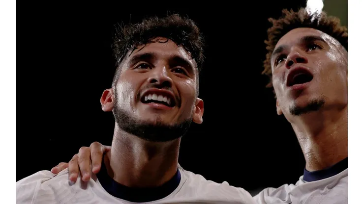 Ricardo Pepi #16 of the United States celebrates with Antonee Robinson
