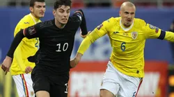 Kai Havertz of Germany (left) and Vlad Chiriches of Romania (right)