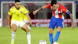 Gustavo Gomez of Paraguay kicks the ball against Radamel Falcao of Colombia