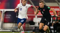 Christian Pulisic #10 of United States and Alistair Johnston #2 of Canada