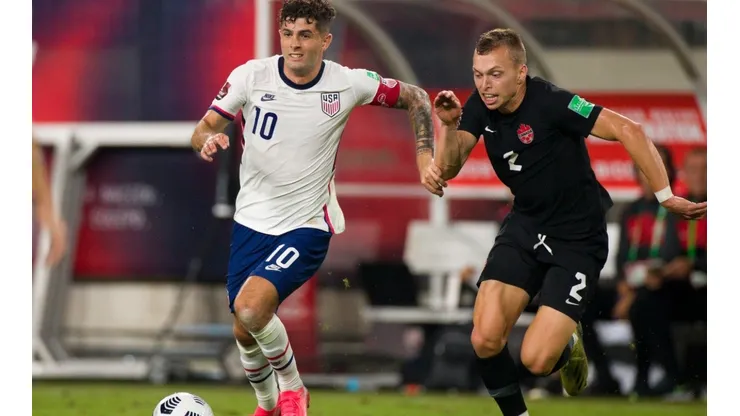 Christian Pulisic #10 of United States and Alistair Johnston #2 of Canada