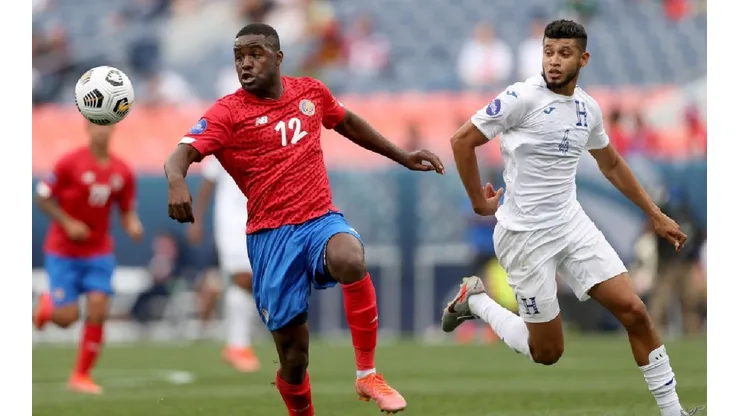 Joel Campbell of Costa Rica (left) and Marcelo Pereira of Honduras
