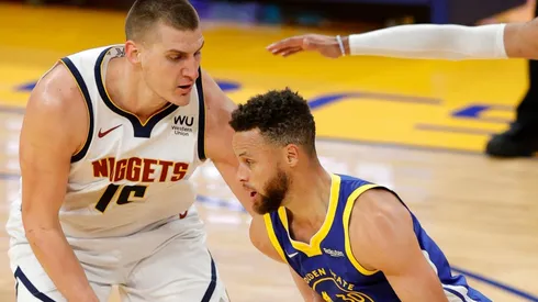 Nikola Jokic of the Denver Nuggets against Stephen Curry of the Golden State Warriors.