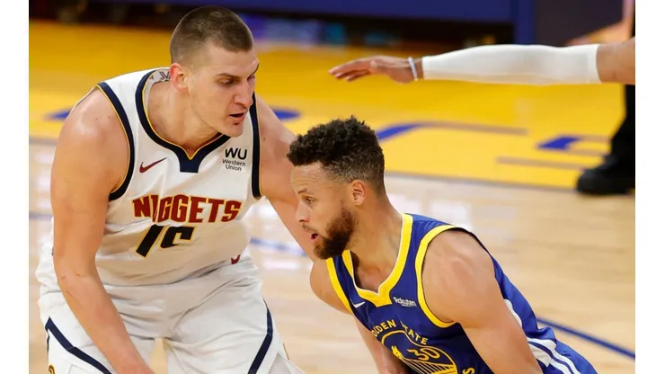 Nikola Jokic of the Denver Nuggets against Stephen Curry of the Golden State Warriors.
