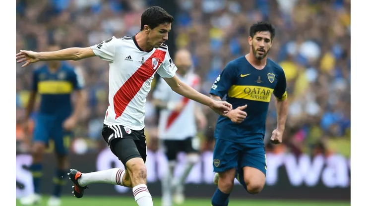 Ignacio Fernandez of River against Pablo Perez of Boca in the first leg of the 2018 Copa Libertadores final at La Bombonera.