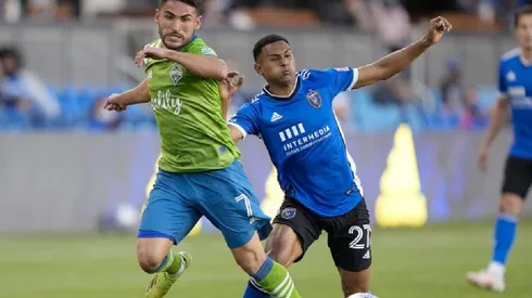 Cristian Roldan of Seattle Sounders (left) fights for ball control against Marcos Lopez of San Jose Earthquakes