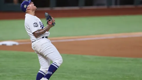 Julio Urias #7 of the Los Angeles Dodgers celebrates after defeating the Tampa Bay Rays 3-1 in Game Six to win the 2020 MLB World Series at Globe Life Field on October 27, 2020.