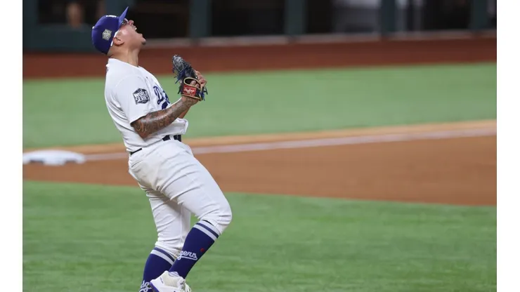 Julio Urias #7 of the Los Angeles Dodgers celebrates after defeating the Tampa Bay Rays 3-1 in Game Six to win the 2020 MLB World Series at Globe Life Field on October 27, 2020.