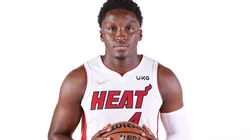 Victor Oladipo posing with the Miami Heat uniform during Media Day.