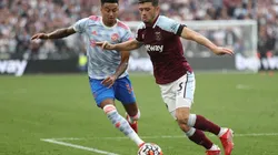 Jesse Lingard of Manchester United (left) and Aaron Cresswell of West Ham (right)