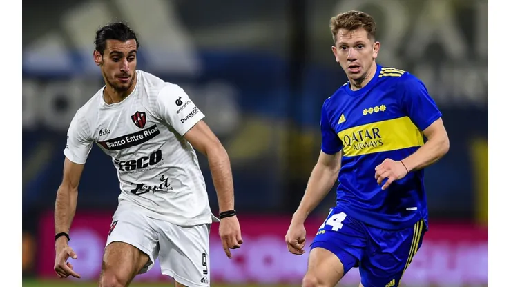Esteban Rolon of Boca Juniors against Sebastian Sosa Sanchez of Patronato.
