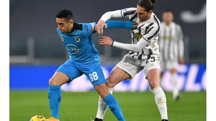 Leonardo de Souza Sena (left) holds the ball against Adrien Rabiot of Juventus (right)
