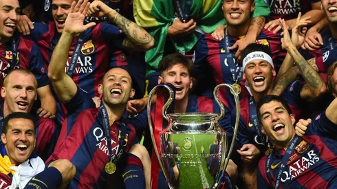 Barcelona players including Javier Mascherano, Lionel Messi, Neymar and Luis Suarez celebrate victory with the trophy after the UEFA Champions League Final between Juventus and FC Barcelona (Getty Images).