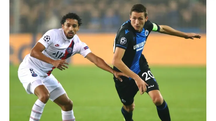 Marquinhos of PSG (left) tries to block Hans Vanaken of Club Brugge (right) (Getty)