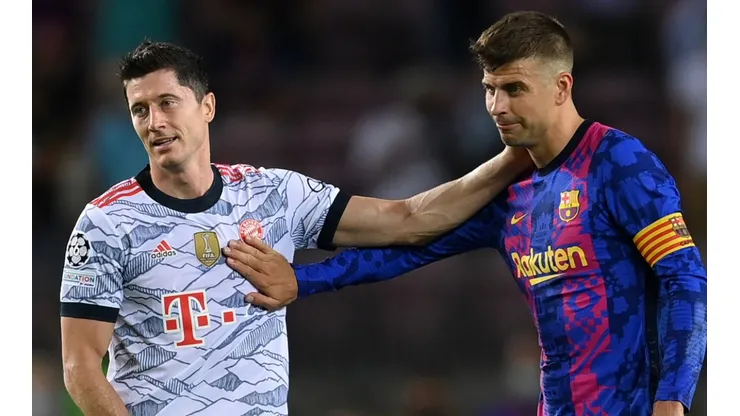 Robert Lewandowski of Bayern (l) and Gerard Pique of Barcelona. (Getty)