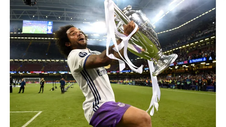 Marcelo of Real Madrid celebrates with the 2016-17 Champions League trophy. (Getty)