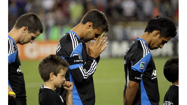 Sam Cronin #4 (L), Chris Wondolowski #8 and Rafael Baca #30 (R) of the San Jose Earthquakes pause for a moment of silence for the victims of September 11, 2001 before their game against the Chicago Fire at Buck Shaw Stadium on September 10, 2011 in Santa Clara, California. (Getty)