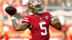 Trey Lance of the San Francisco 49ers throws a touchdown pass. (Getty)