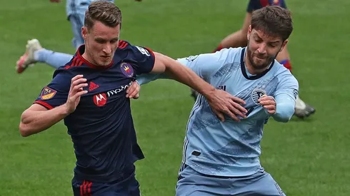 Fabian Herbers of Chicago Fire fighting for the ball against Illie Sanchez of Sporting Kansas City. (Getty)