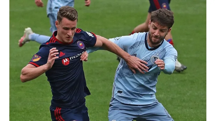 Fabian Herbers of Chicago Fire fighting for the ball against Illie Sanchez of Sporting Kansas City. (Getty)