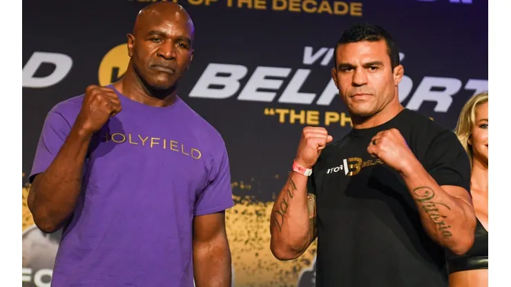 Evander Holyfield (left) and Vitor Belfort (right). (Getty)
