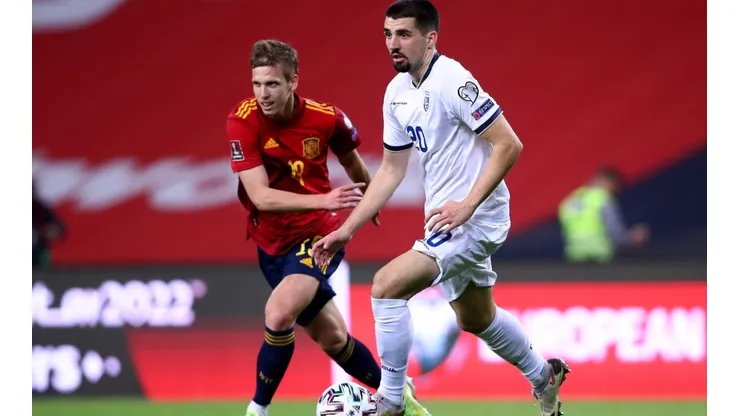 Ibrahim Dresevic of Kosovo is challenged by Dani Olmo of Spain during the FIFA World Cup 2022 Qatar qualifying match between Spain and Kosovo at Estadio Olimpico on March 31, 2021 in Seville, Spain. (Getty)