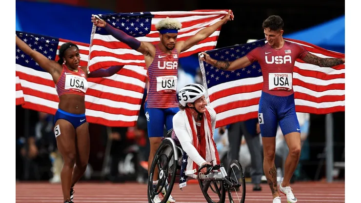 The United States celebrate after winning gold in the 4x100m Universal Relay. (Getty)