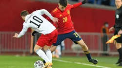 Otar Kiteishvili of Georgia (left) fights for ball control with Pedri of Spain (right) (Getty)