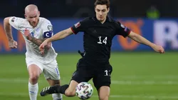 Aron Gunnarsson of Iceland (left) tries to block Florian Neuhaus of Germany (right) (Getty)