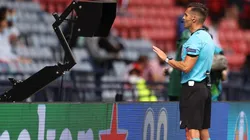 The match referee checks the VAR screen at Euro 2020. (Getty)