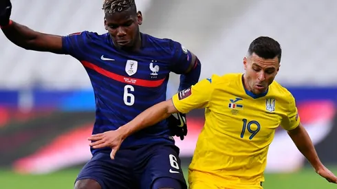 Paul Pogba of France (left) battles for possession with Junior Moraes of Ukraine (right). (Getty)