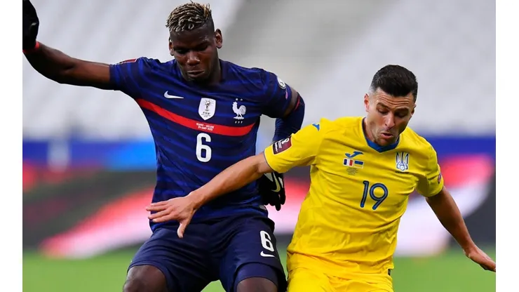 Paul Pogba of France (left) battles for possession with Junior Moraes of Ukraine (right). (Getty)