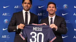 Lionel Messi and Nasser Al-Khelaifi hold up the PSG jersey (Getty Images)