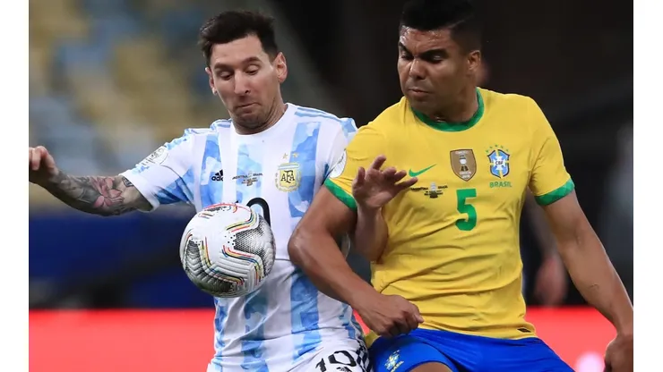 Argentina's Lionel Messi and Brazil's Casemiro fight for the ball (Getty).