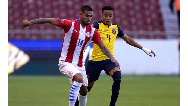 Hector Martinez of Paraguay and Byron Castillo of Ecuador. (Getty)