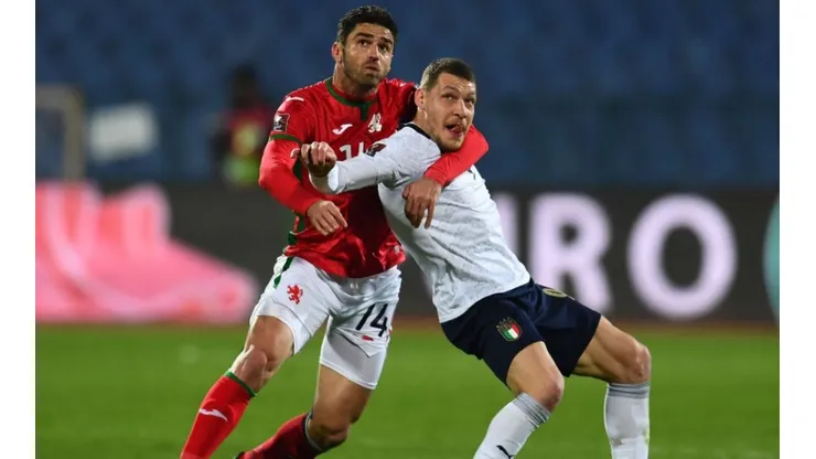 Daniel Dimov of Bulgaria (left) fights for ball control against Andrea Belotti of Italy (right) (Getty)