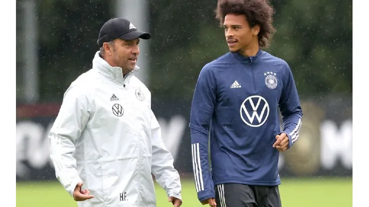 Hans-Dieter Flick (left) and Leroy Sane (right) of Germany at the training camp before the game against Liechtenstein (Getty)