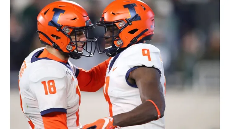 Brandon Peters (left) and Josh Imatorbhebhe (right) of Illinois Fighting Illini (Getty)