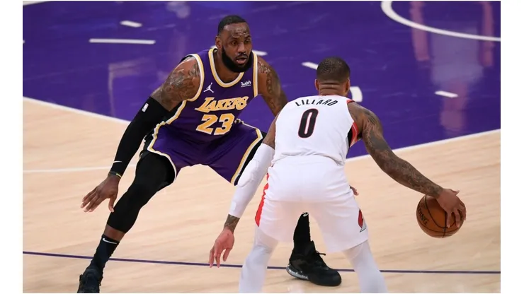 LeBron James guarding Damian Lillard. (Getty)