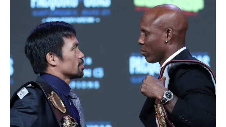 Manny Pacquiao (left) and Yordenis Ugas will fight with the WBA welterweight belt on the line. (Getty)