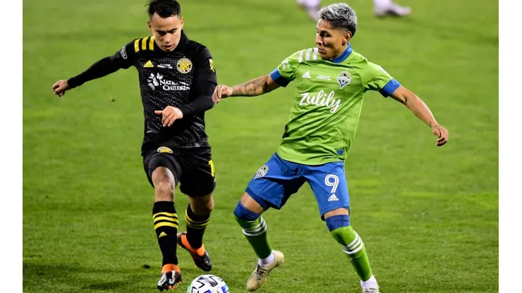 Lucas Zelarrayan of Columbus Crew (left) fights for the ball with Raul Ruidiaz of Seattle Sounders (Getty).