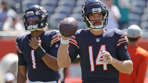 Chicago Bears #14 Andy Dalton and #1 Justin Fields will battle for the starting QB role. (Getty)