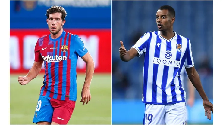 Sergi Roberto of Barcelona (left) and Alexander Isak of Real Sociedad. (Getty)