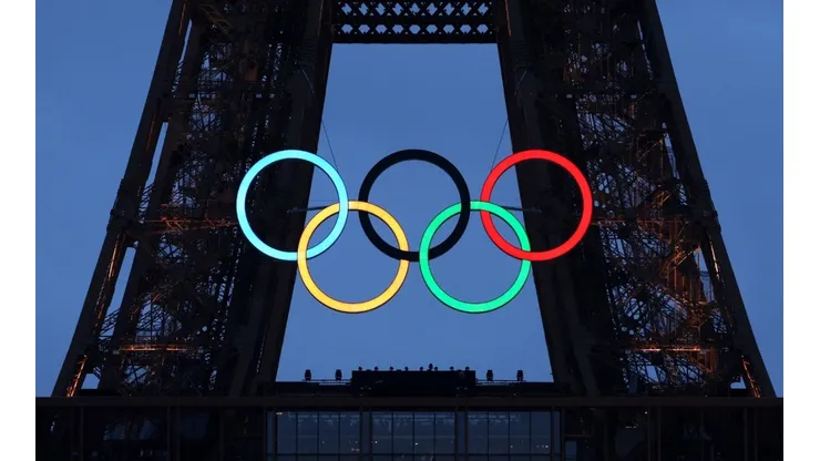 The Olympic Rings illuminate on the Eiffel Tower during the opening ceremony of the Olympic Games Paris 2024 on July 26, 2024 in Paris, France.